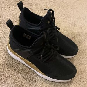 Black and Gold Puma Sneakers